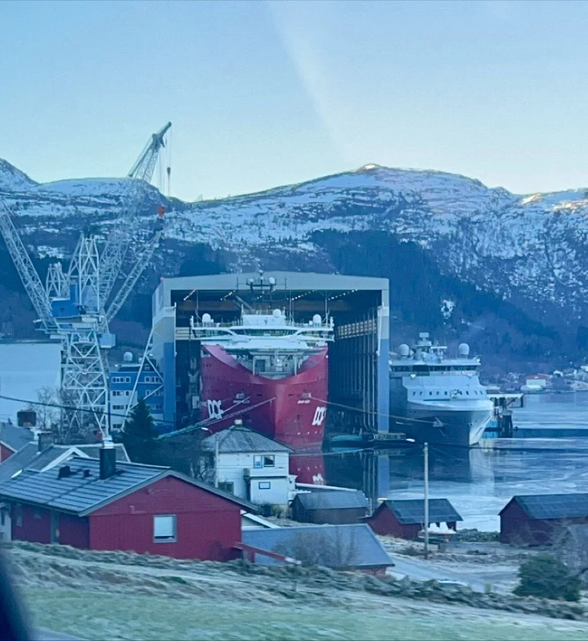 A DOF vessel alongside an industrial quay.